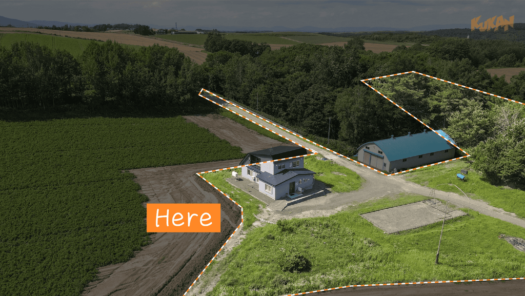 Aerial view showing the site boundary of resort development land for sale near Biei's Ken & Mary Tree in Hokkaido