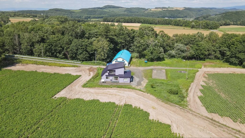 Aerial view of resort development land for sale near Biei's Ken and Mary Tree in Hokkaido