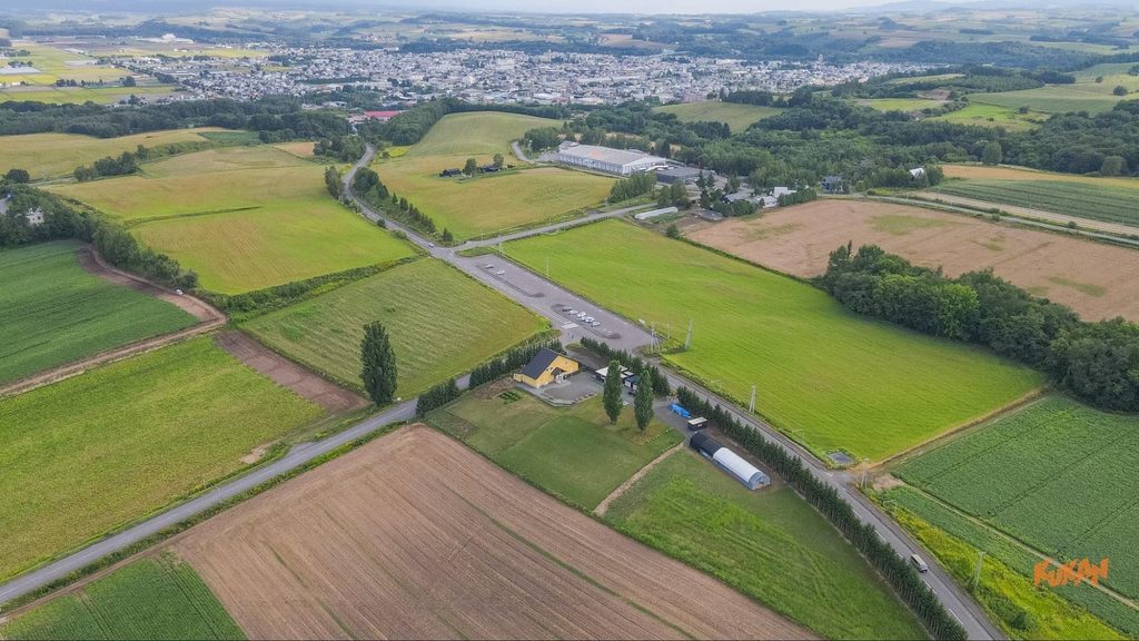 Panoramic aerial view of resort development land near Biei's Ken & Mary Tree in Hokkaido